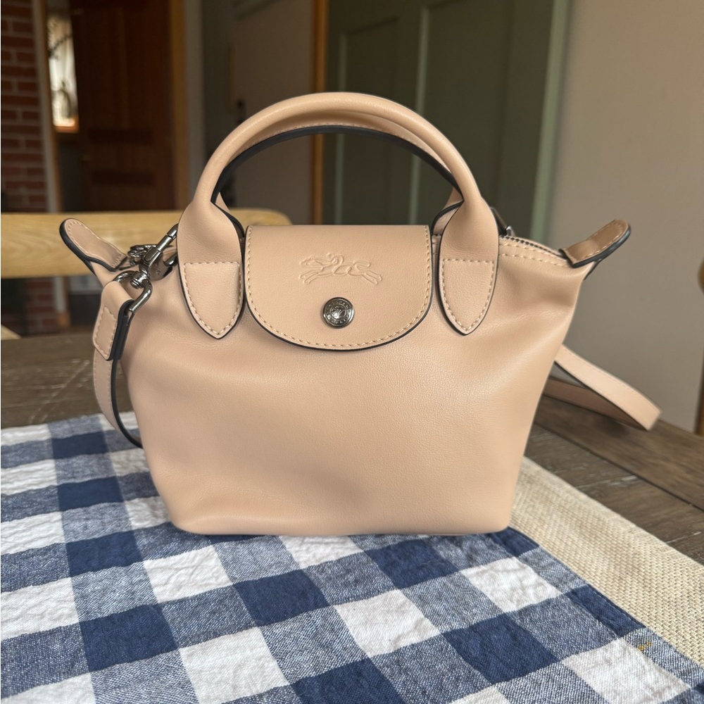 Longchamp Le Pliage cuir XS apricot color